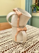 Uroczy kubek ceramiczny z jasnoróżową kokardką ok 250ml